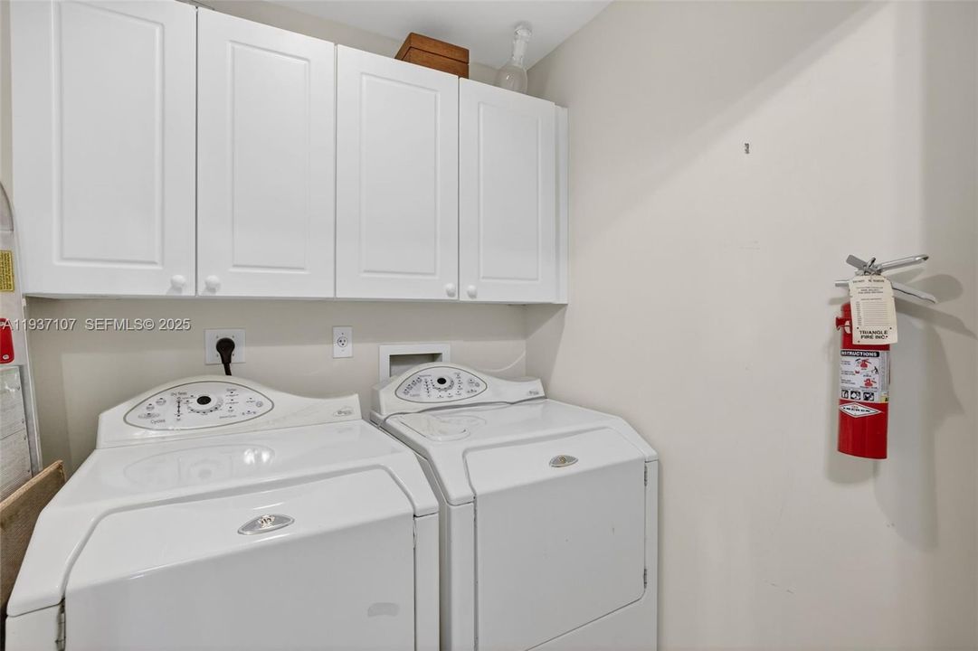 Separate laundry room w/ small closet inside room