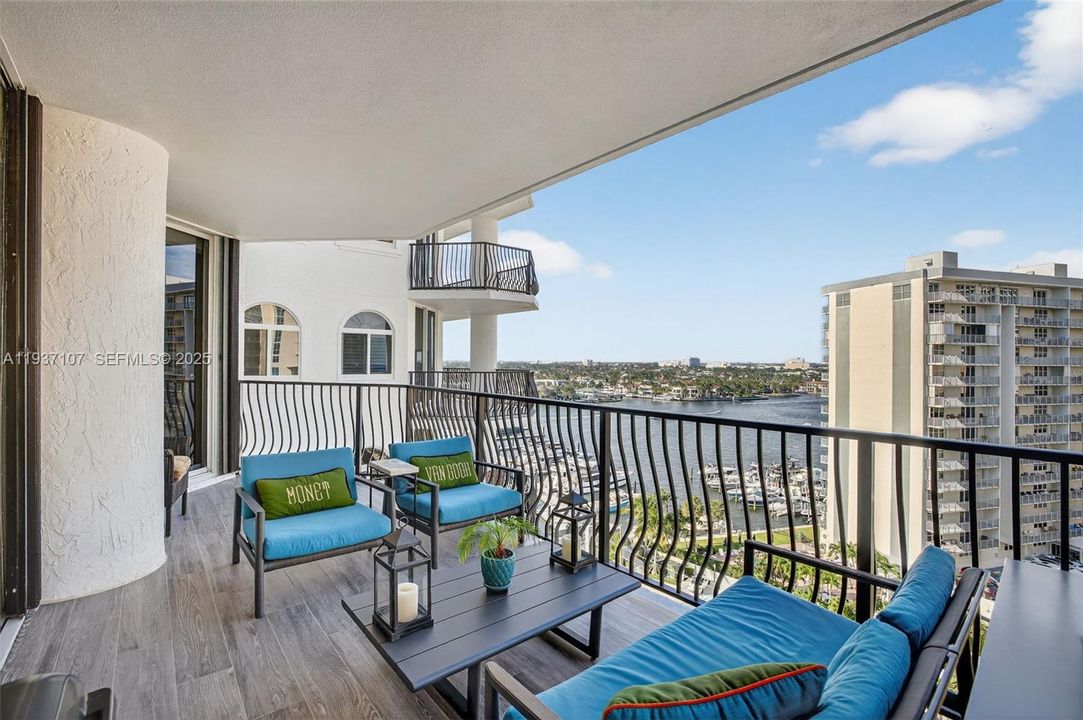 Actual balcony. New plank wood look tile flooring. Expansive balcony w/ room for dining, lounge seating and electric grill. With gorgeous water views.