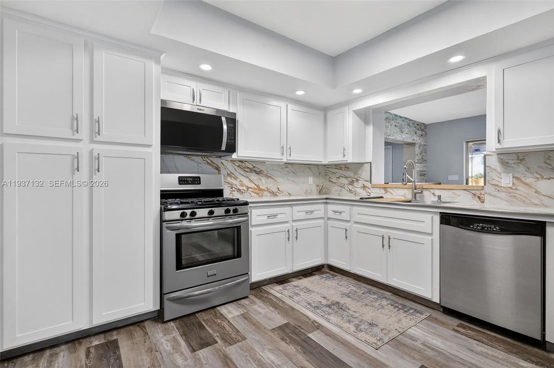 ONE OF TWO LIVING ROOMS