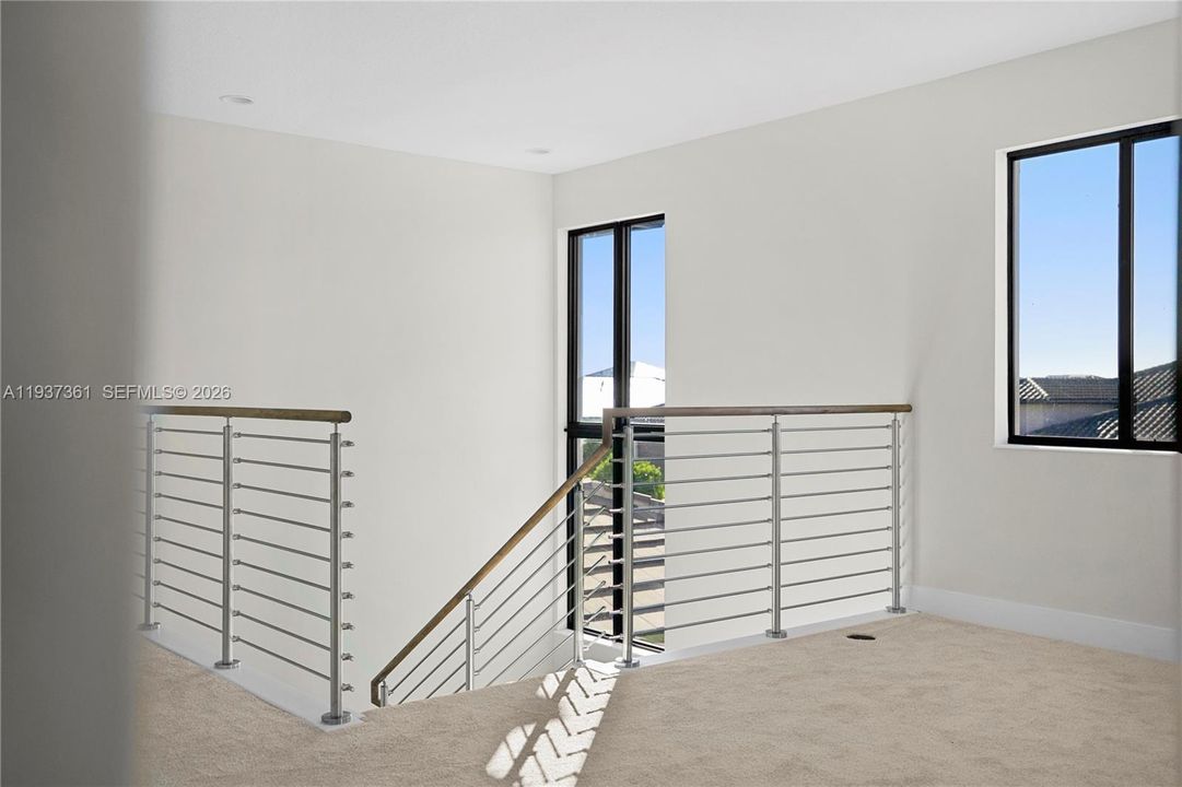 Open loft area offering flexible living space