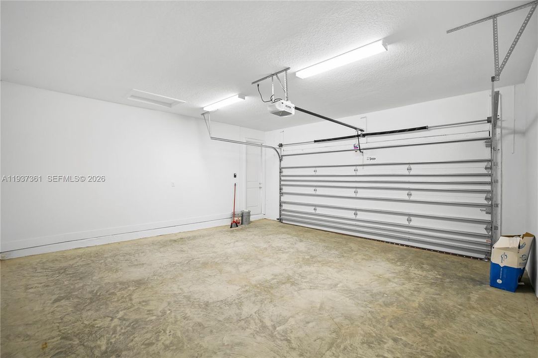 Two-car garage offering ample space for parking and storage
