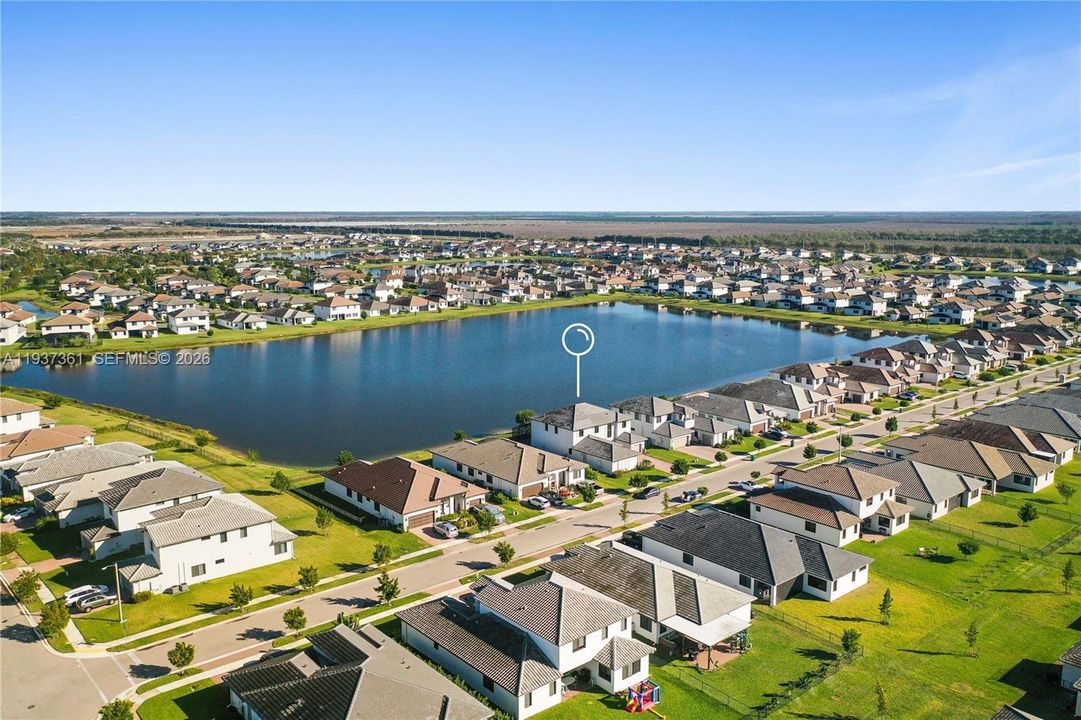 Aerial view of Maple Ridge at Ave Maria with lakefront homes