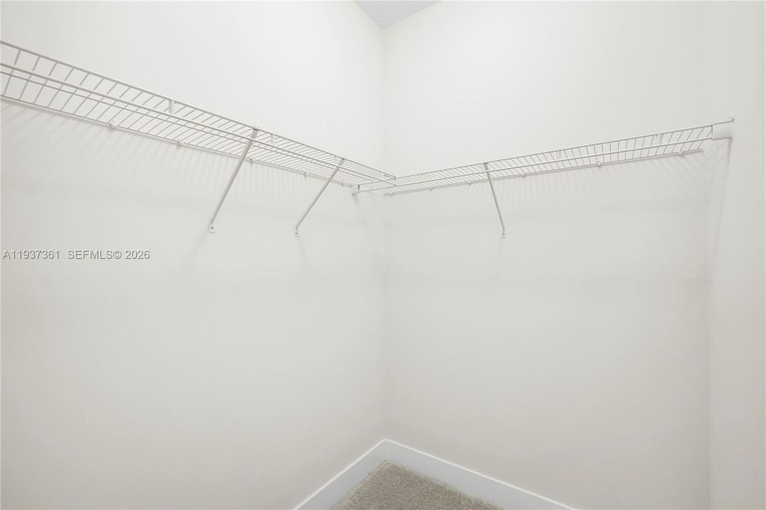 Walk-in closet for the second Jack-and-Jill bedroom