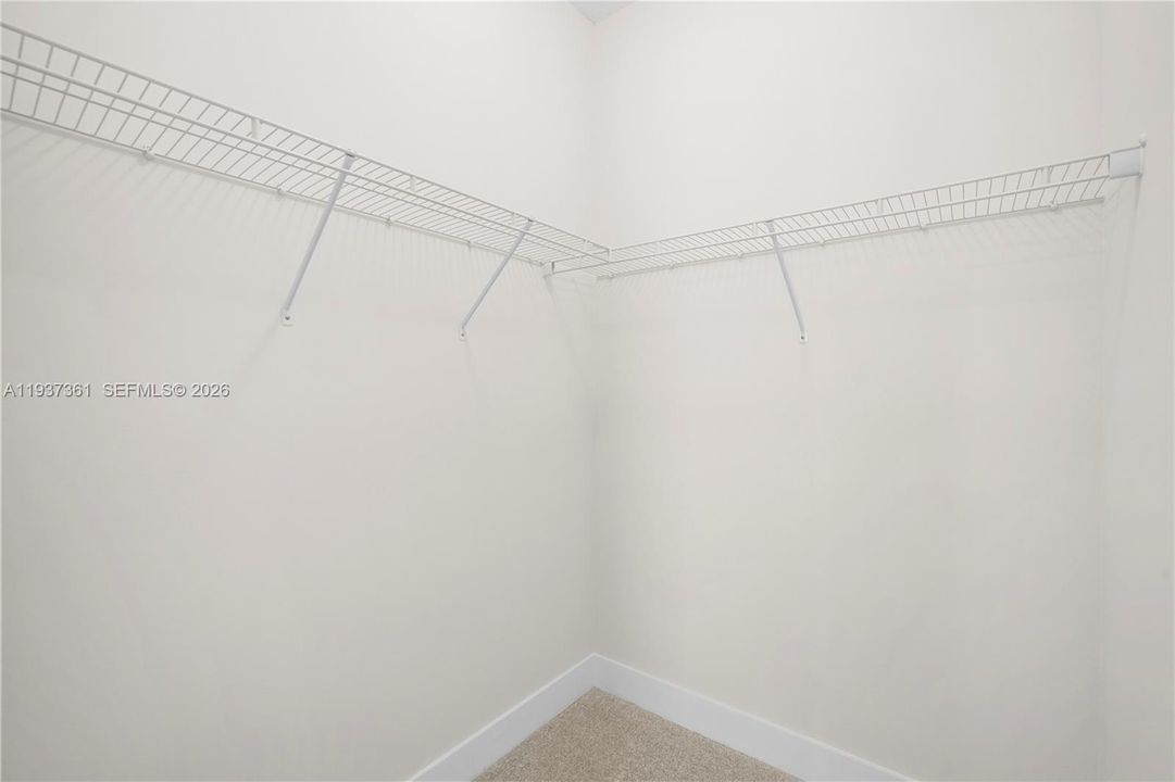 Walk-in closet for the second Jack-and-Jill bedroom