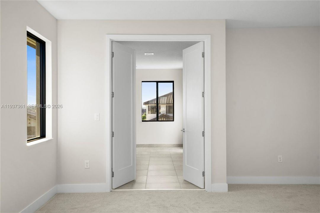 Primary en-suite entry from the primary bedroom