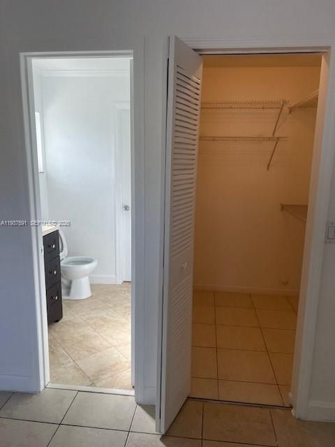 Primary 1/2 bath and walk in closet