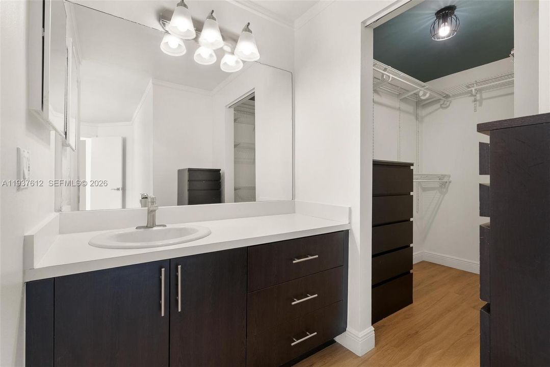 next to the large walk-in closet