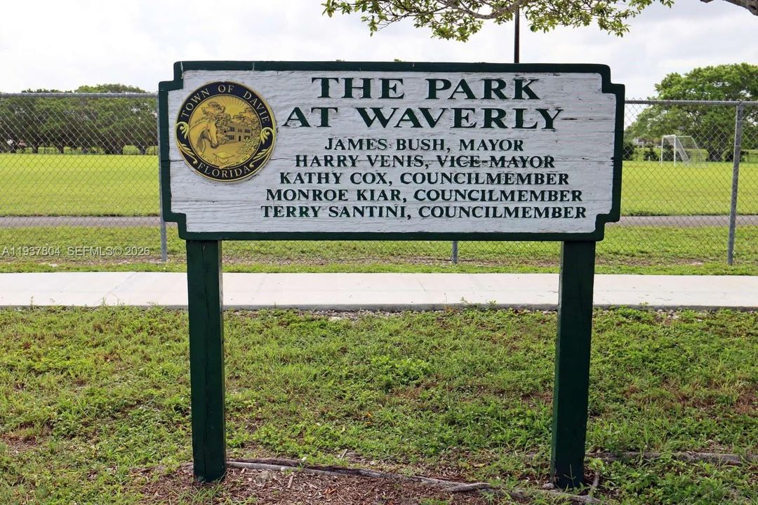 8 acre park in the neighborhood with long walking path, two tennis courts, two basketball courts, a volleyball court, soccer goals, playground area with equipment, a backstop, a large open field and water