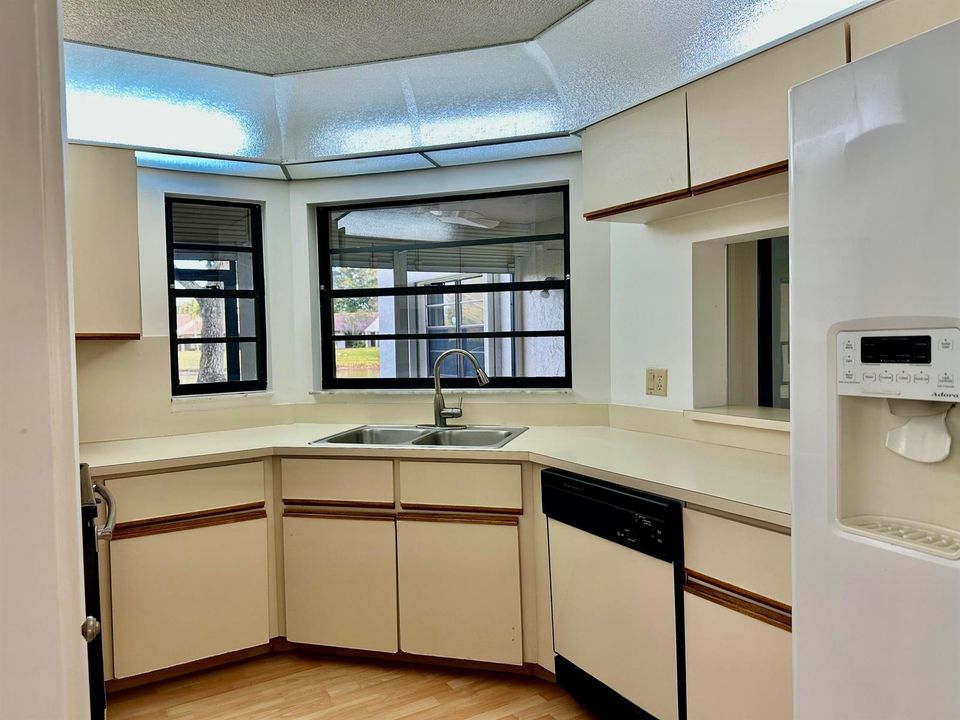 KITCHEN WITH PASS THRU AND LAKE VIEW