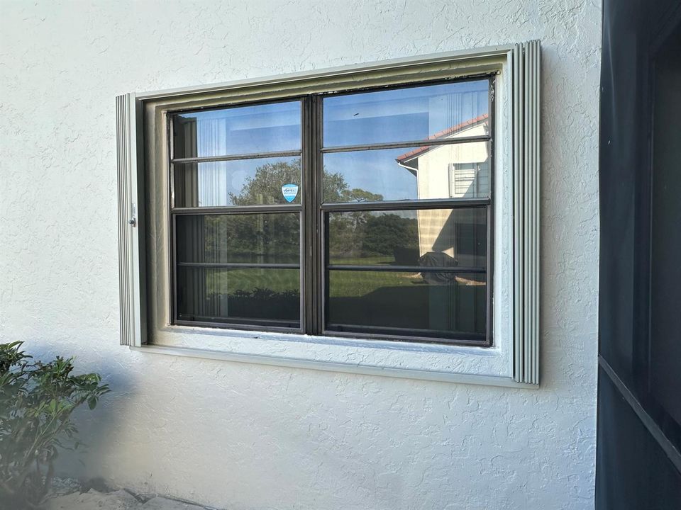 WINDOW ACCORDIAN SHUTTERS