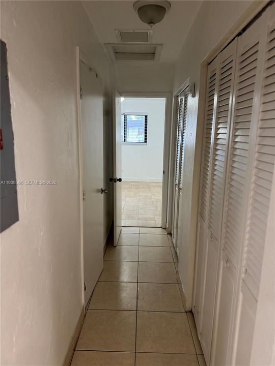 Hallway with closets