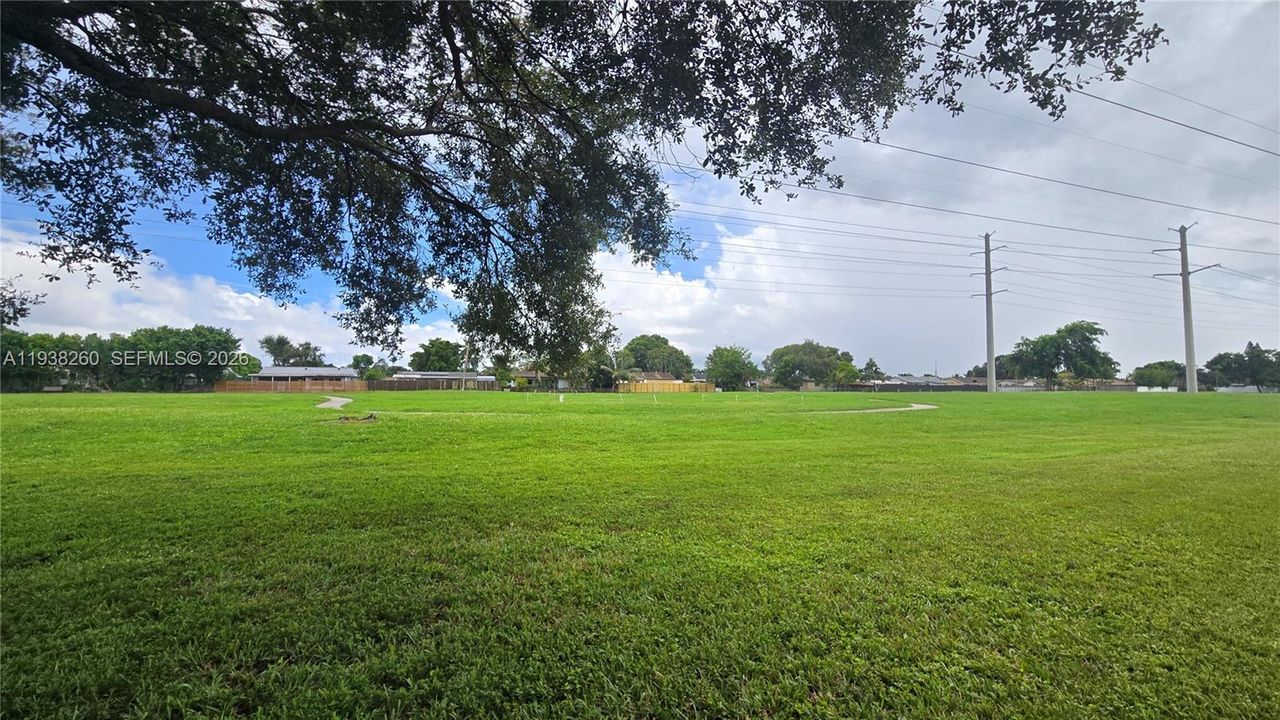 Backs up to Dog park & trail