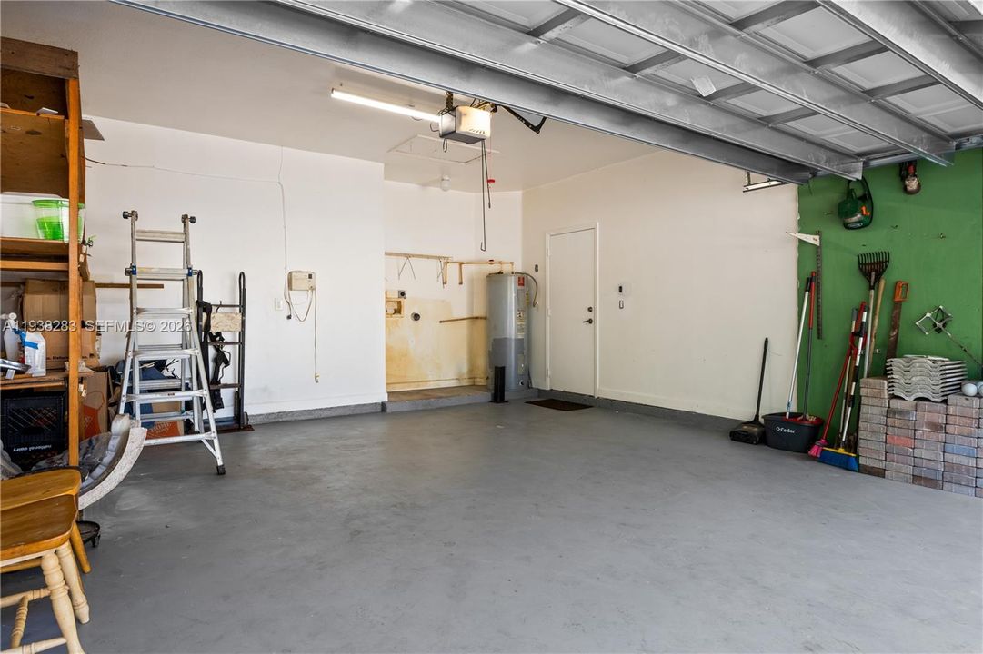 Two car garage with water heater and Washer/Dryer hookup.