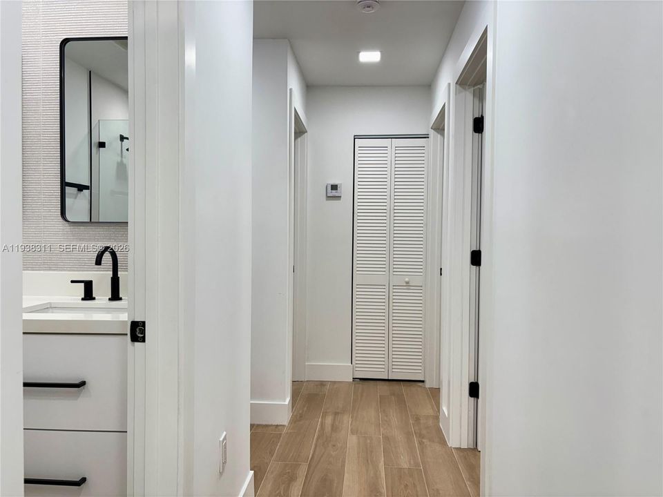 Hallway leading to Bedrooms and Bathrooms