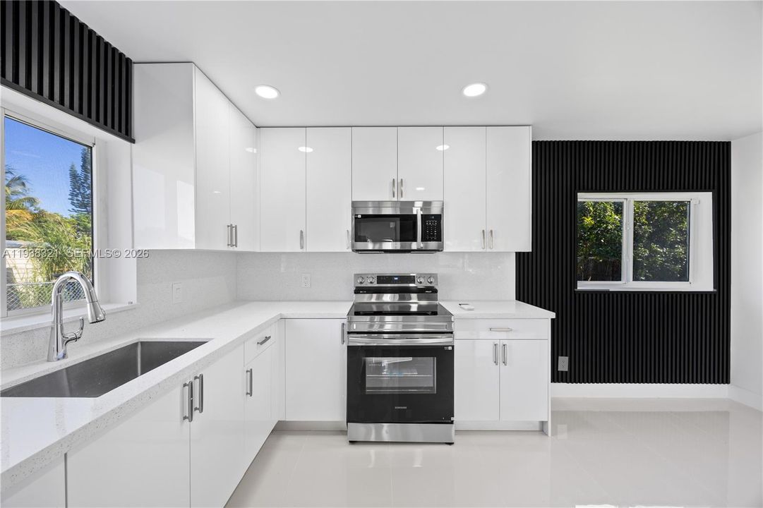 Gorgeous Kitchen with Samsung S.S appliances and a big wide deep sink.