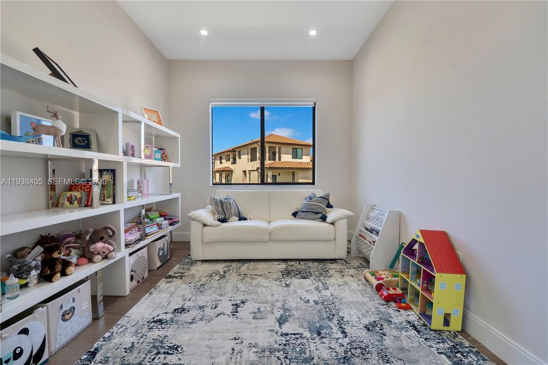 Upstairs family room can be converted to a 4th bedroom.