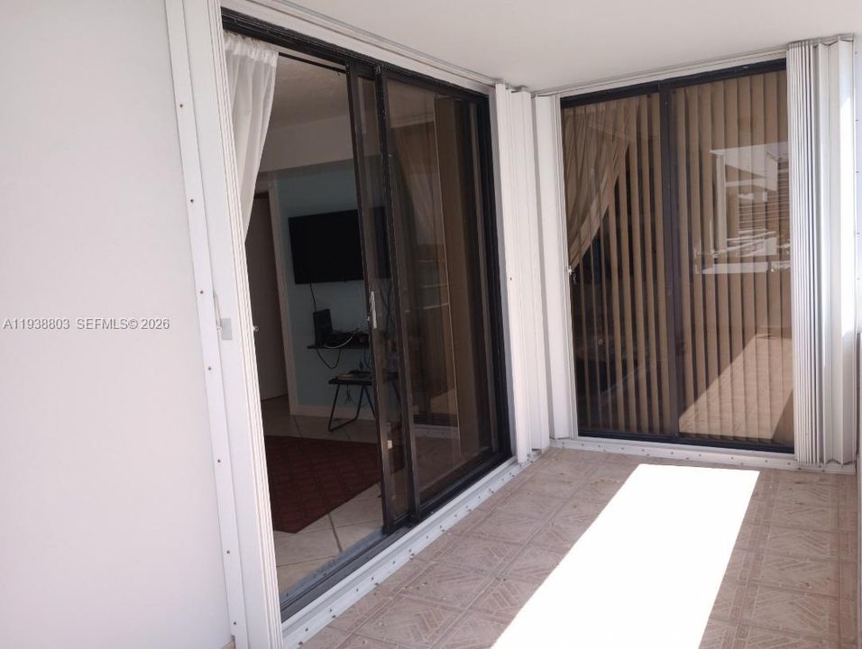 BACLONY FROM LIVING ROOM AND PRIMERY BEDROOM