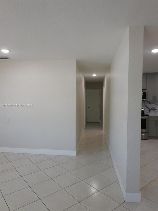Hallway leading to 2nd bedroom and bathroom.