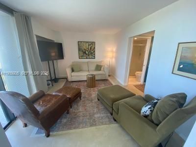 Guest Bedroom with en suite bath & balcony entrance