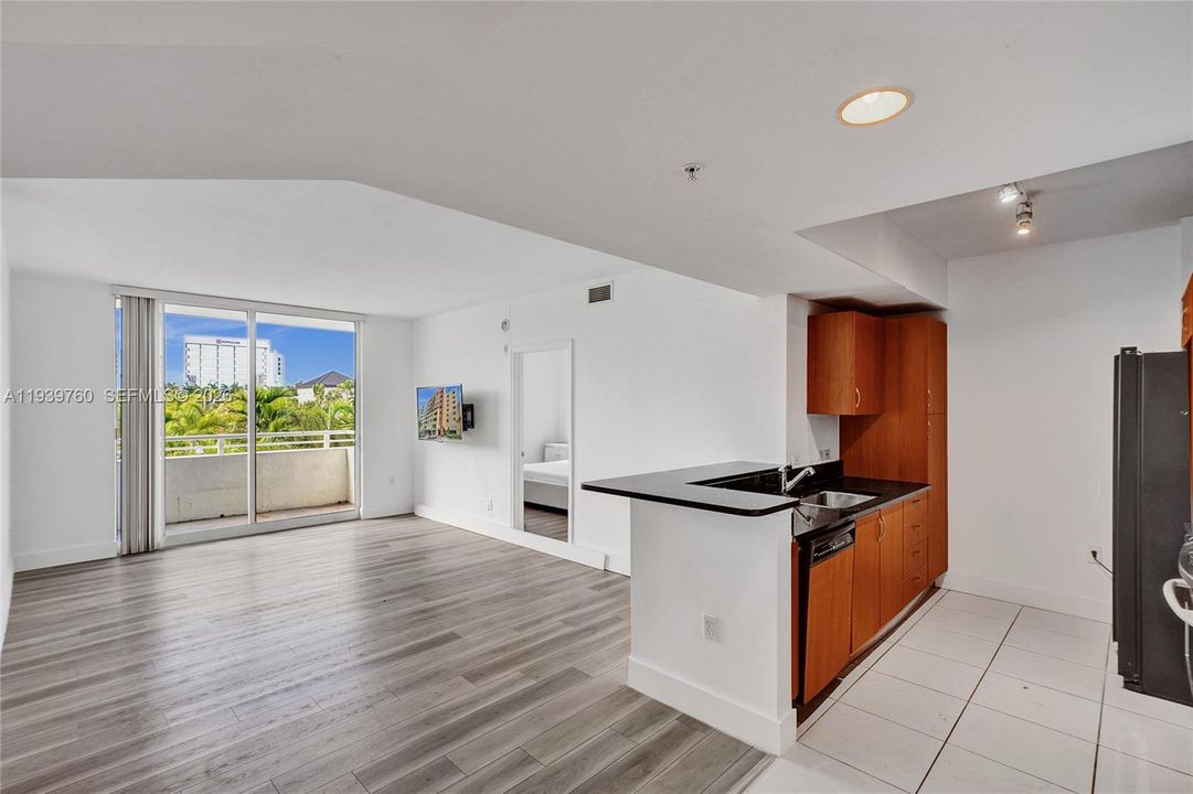 SPECIAL PRICE!!! Buy a 2-BEDROOM Deal – Priced Like a 1-Bedroom at 2775 NE 187TH ST #202 — PRICE, LOCATION! Walking distance to Publix, parks, shops, and synagogues — everything you need just steps away! Step into this beautifully updated apartment offering: spacious bedrooms, each with walk-in closets,A modern kitchen with granite countertops and stainless steel appliances, Laminate flooring throughout, In-unit washer and dryer.Enjoy resort-style amenities, including:4 infinity pools with cabanas,State-of-