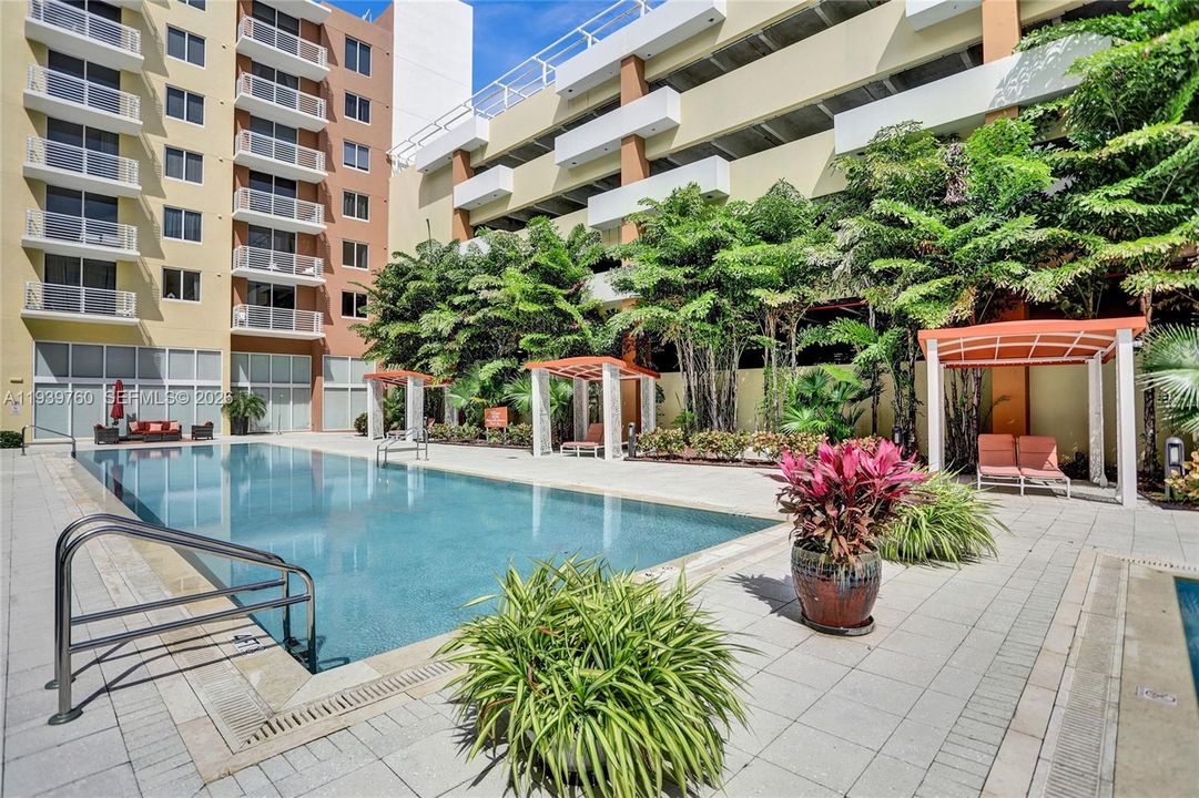 SPECIAL PRICE!!! Buy a 2-BEDROOM Deal – Priced Like a 1-Bedroom at 2775 NE 187TH ST #202 — PRICE, LOCATION! Walking distance to Publix, parks, shops, and synagogues — everything you need just steps away! Step into this beautifully updated apartment offering: spacious bedrooms, each with walk-in closets,A modern kitchen with granite countertops and stainless steel appliances, Laminate flooring throughout, In-unit washer and dryer.Enjoy resort-style amenities, including:4 infinity pools with cabanas,State-of-