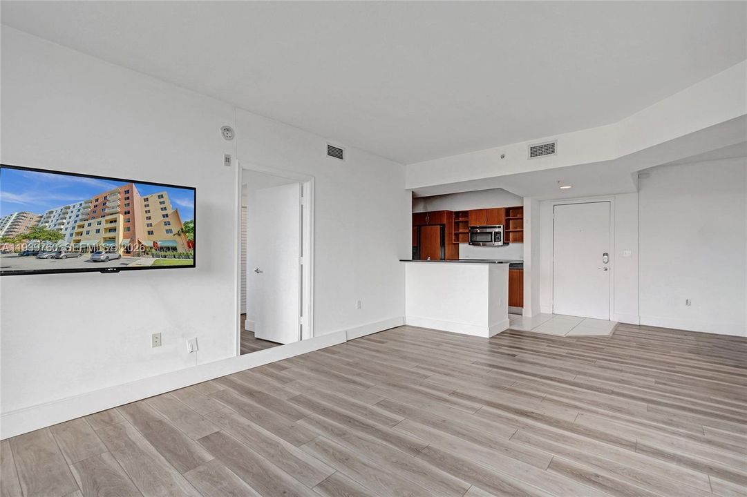 SPECIAL PRICE!!! Buy a 2-BEDROOM Deal – Priced Like a 1-Bedroom at 2775 NE 187TH ST #202 — PRICE, LOCATION! Walking distance to Publix, parks, shops, and synagogues — everything you need just steps away! Step into this beautifully updated apartment offering: spacious bedrooms, each with walk-in closets,A modern kitchen with granite countertops and stainless steel appliances, Laminate flooring throughout, In-unit washer and dryer.Enjoy resort-style amenities, including:4 infinity pools with cabanas,State-of-