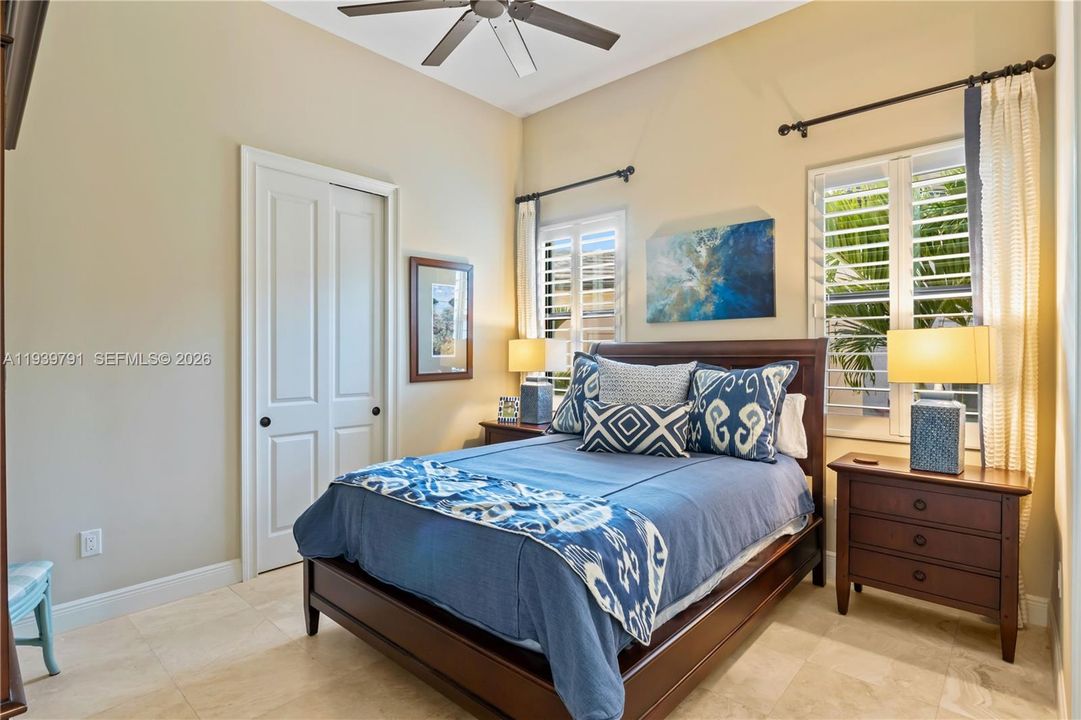 Guest suite designed for comfort and style, natural illumination, and a calming atmosphere. Plantation shutters, neutral flooring and generous space!