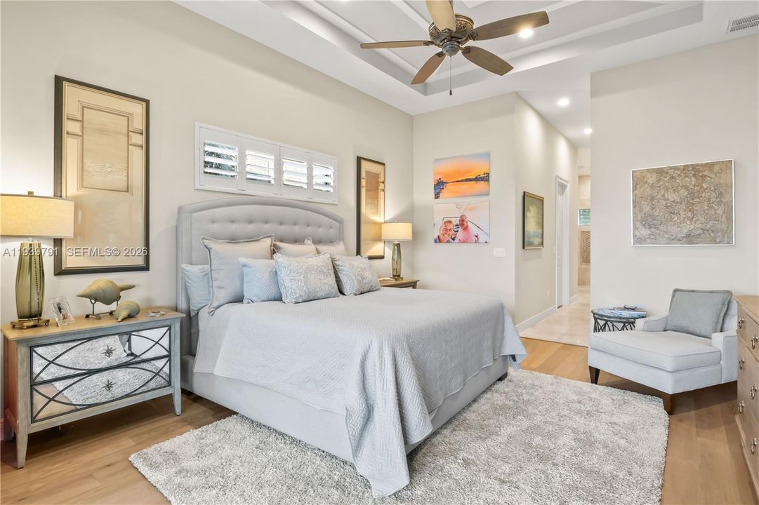 Spacious suite designed for relaxation, with premium flooring and a seamless connection to the outdoor oasis.