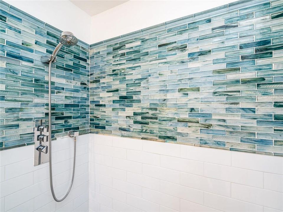 GLASS TILED SHOWER IN MASTER BATH