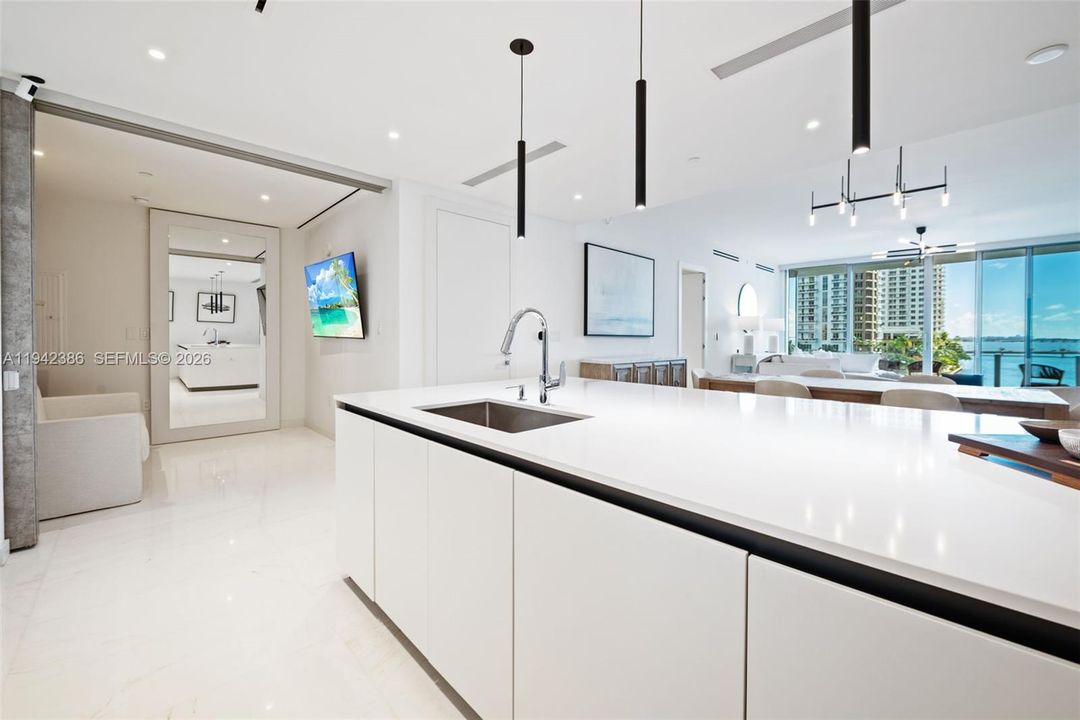 Open Den from kitchen perspective.