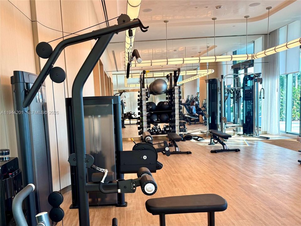 Fitness Center overlooking pool area on beach side