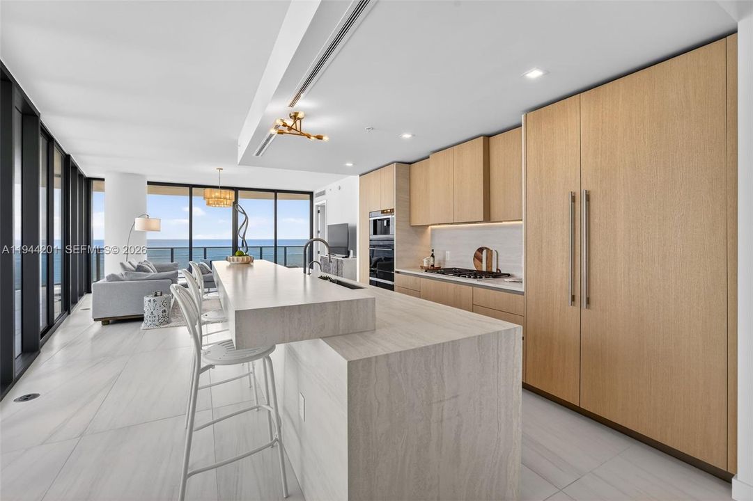 Chef-ready galley kitchen with Sub-Zero and Wolf appliances w/ wine cooler, plus integrated espresso/cappuccino system. Italian cabinetry and stone counters