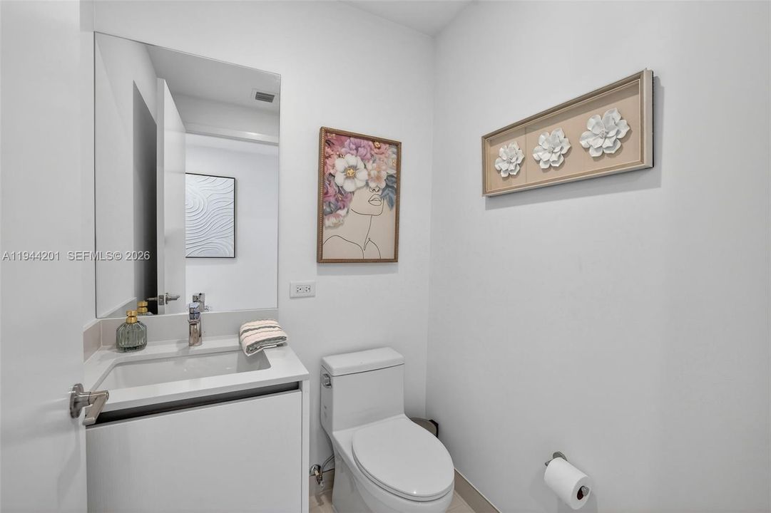 Powder Room near foyer entrance