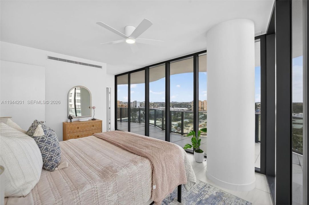 Guest Bedroom #2 - ensuite bathroom w/ walk in closet, w/ wrap around balcony and views to the west and north