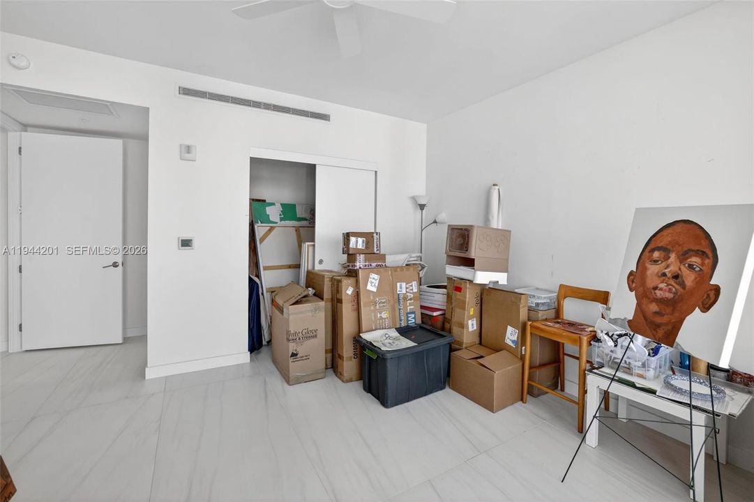 Bedroom 3 w/ ensuite bathroom w/ closet, w/ sliders to balcony and views to the west