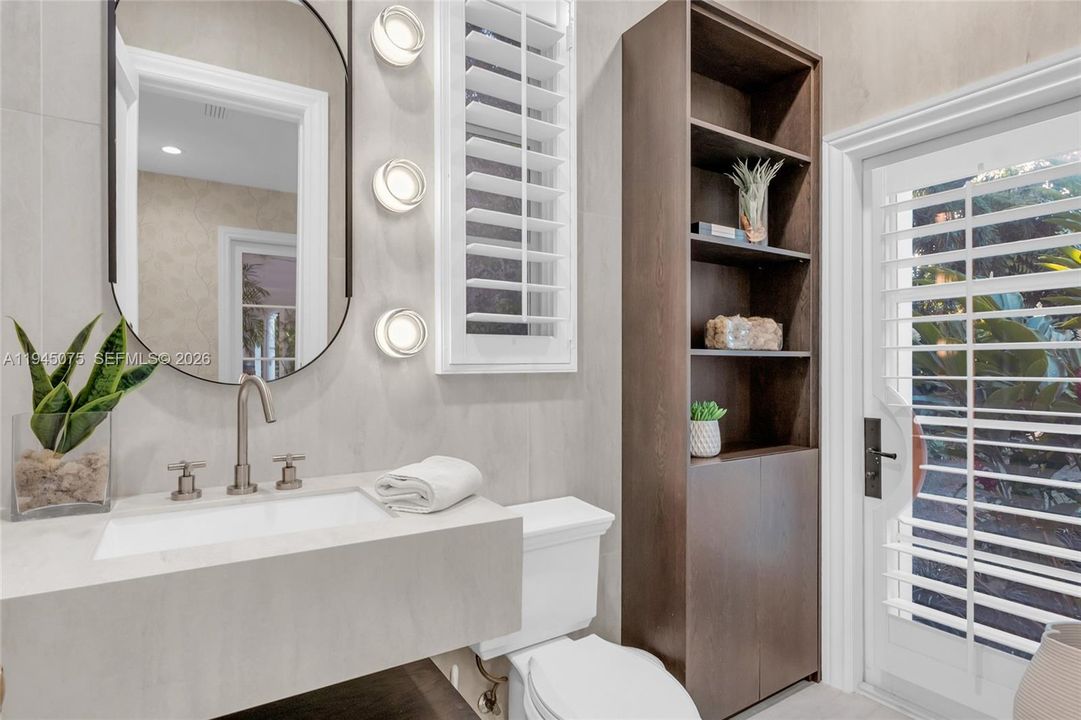 Powder room with pool access