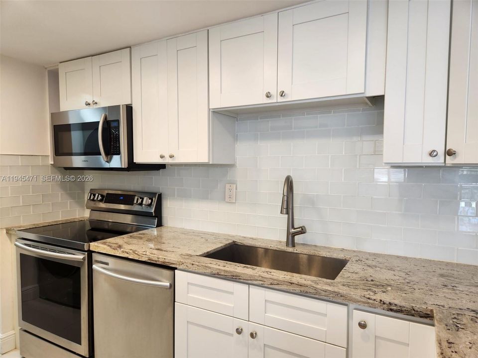 Additional view of kitchen.