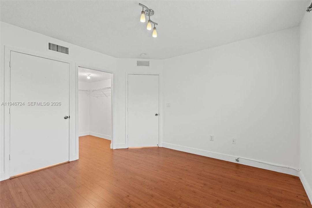 Facing the bedroom entrance door
