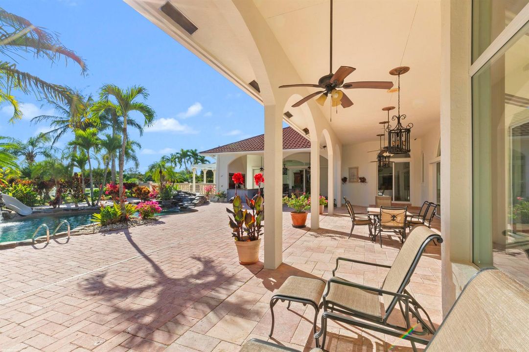 Covered patio overlooking the pool