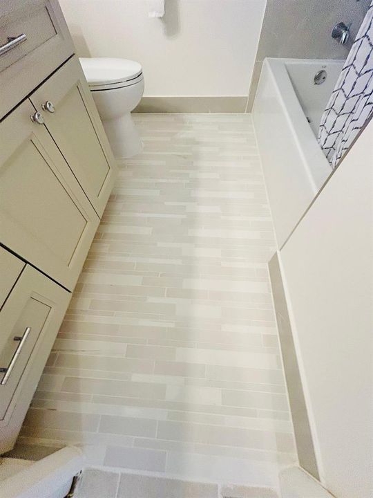 NEW TILE FLOORING