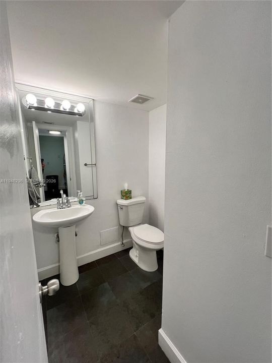 half bathroom near front door