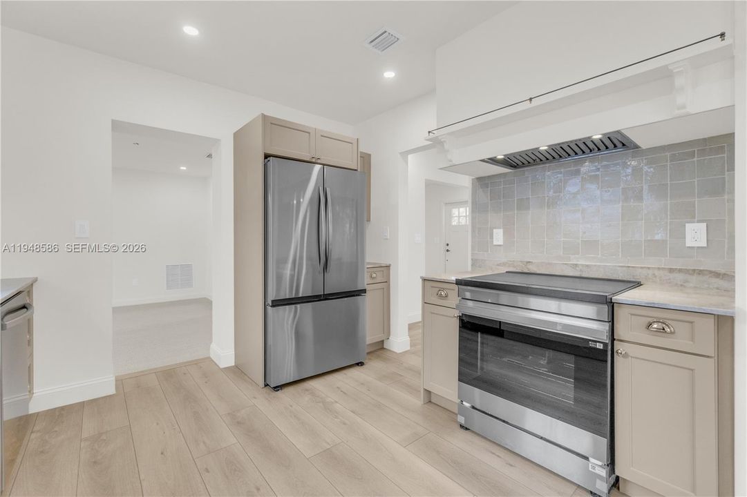 Kitchen with Flow to Dining & Family Rooms