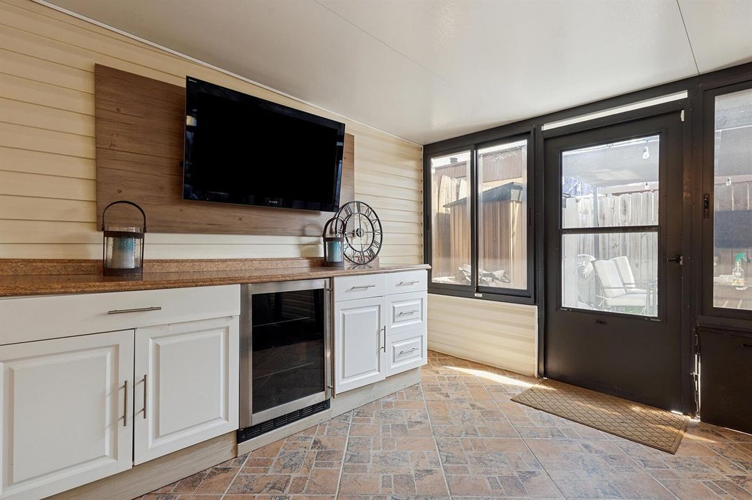 Sunroom with built in wine fridge
