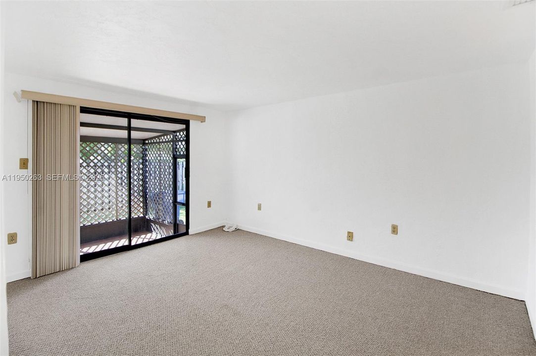 View of primary bedroom that goes out to patio
