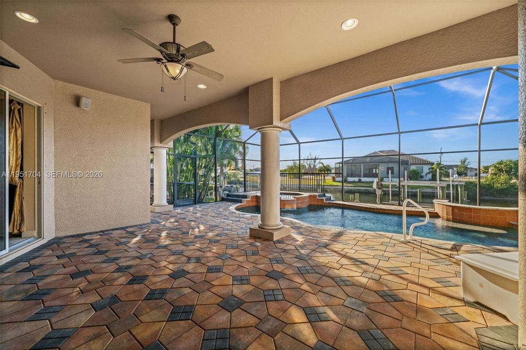 Extensive paver lanai and deck space