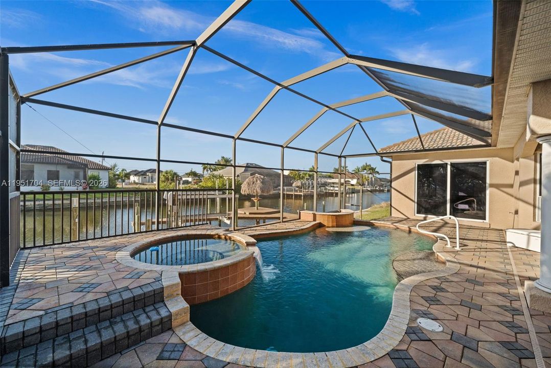 Pool with waterfall spa