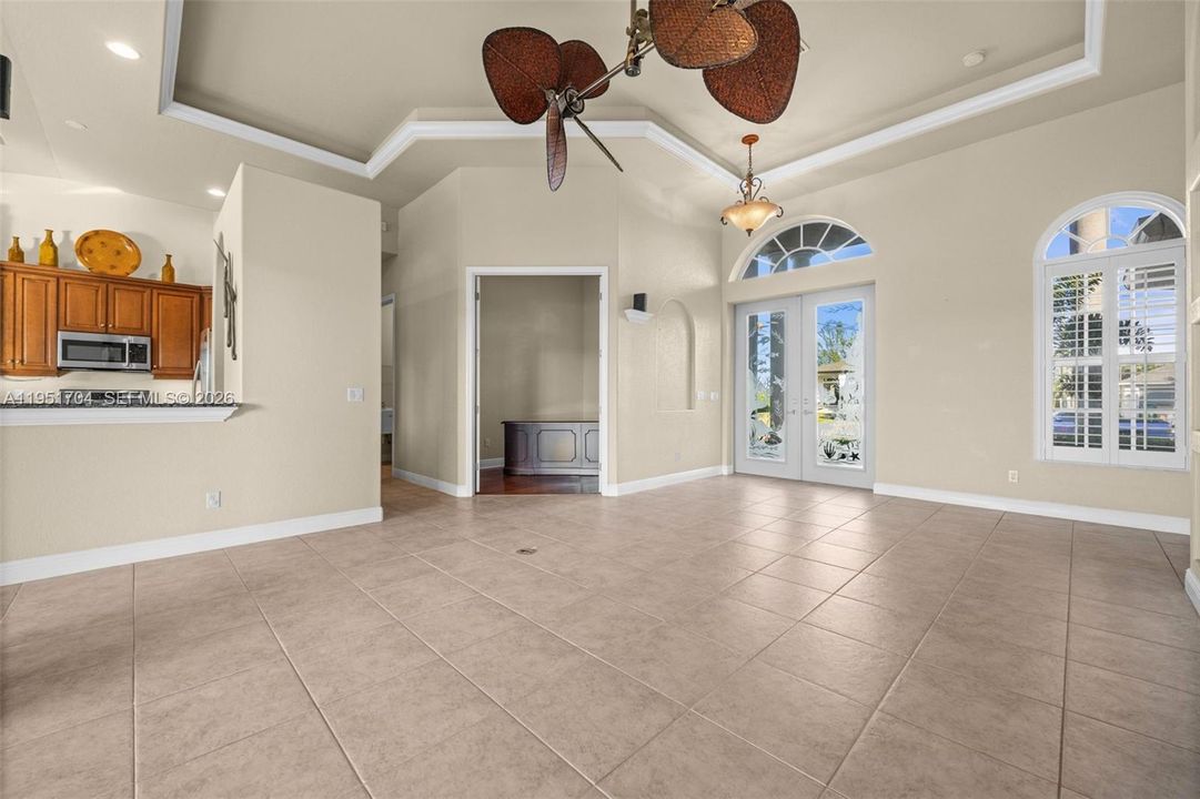 Open great room with soaring tray ceilings