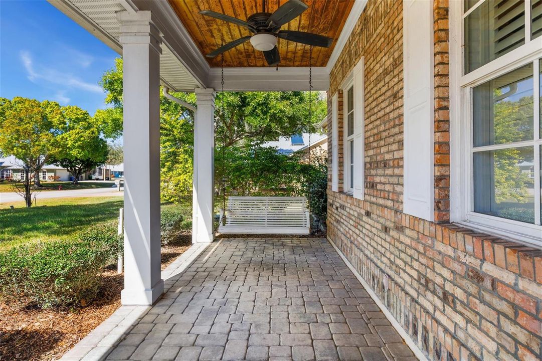 Front porch with two swings.