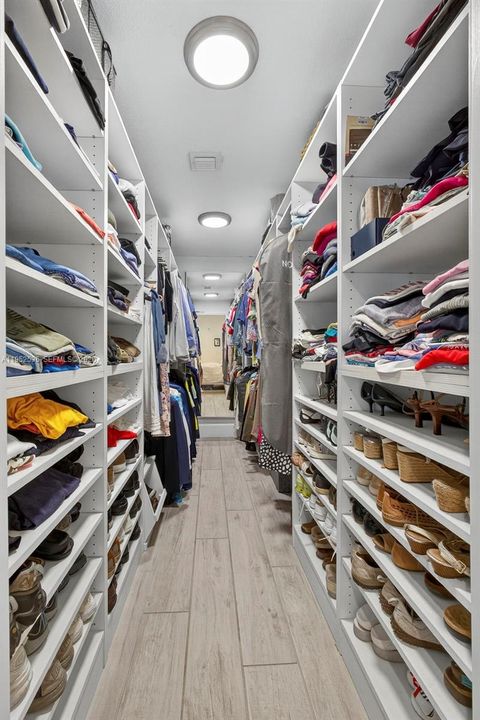 Primary Walk-in closet with built-ins