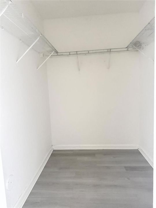Walking closet in master bedroom